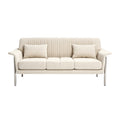 **Prosty sofa z poduszkami w kremowym kolorze**